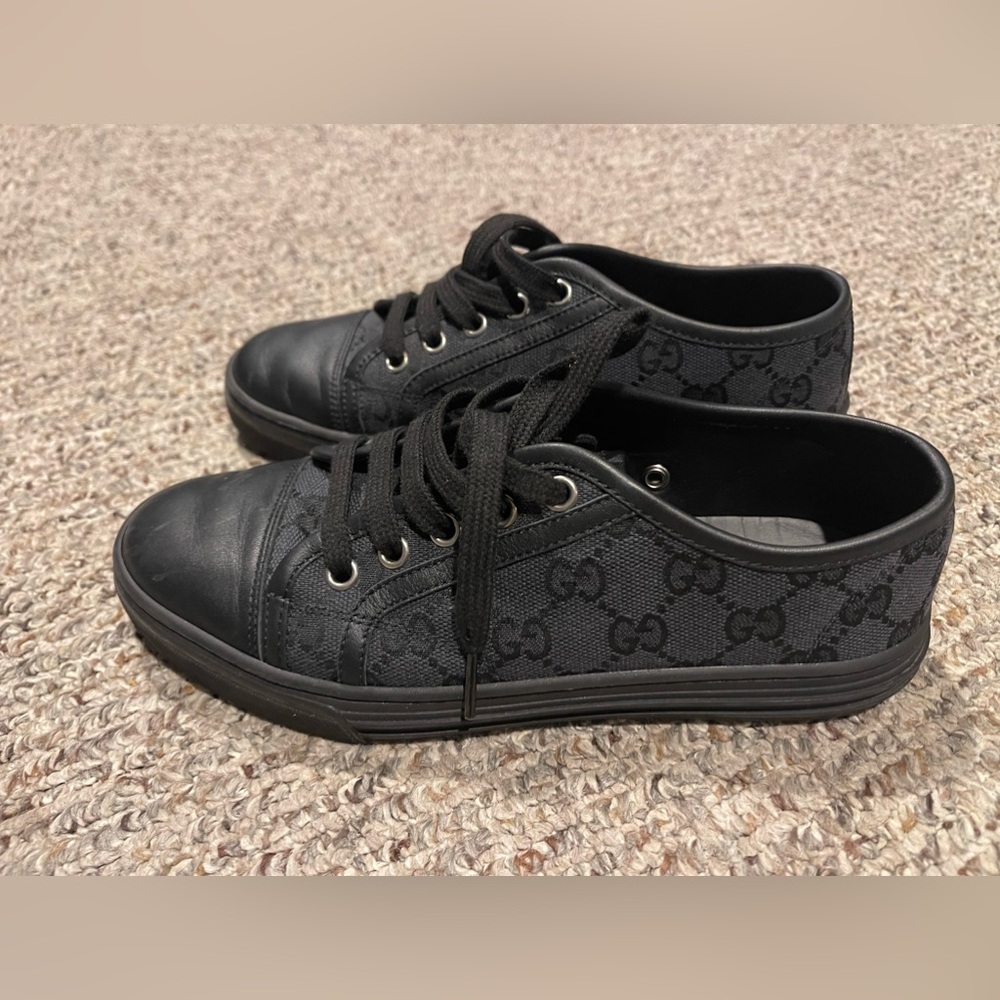 Black Gucci sneakers